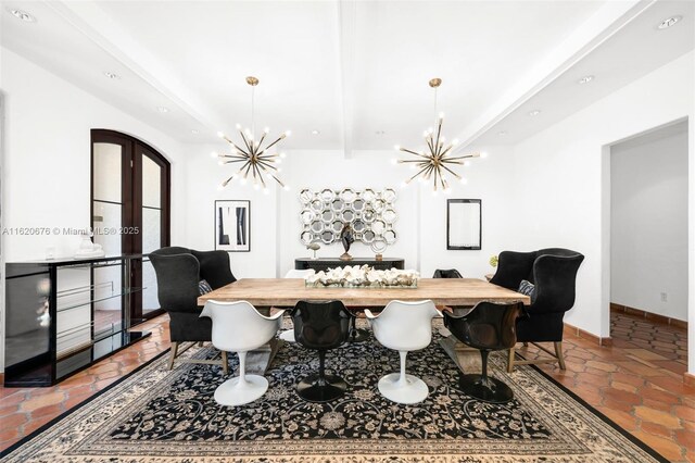 dining area with beamed ceiling and a notable chandelier