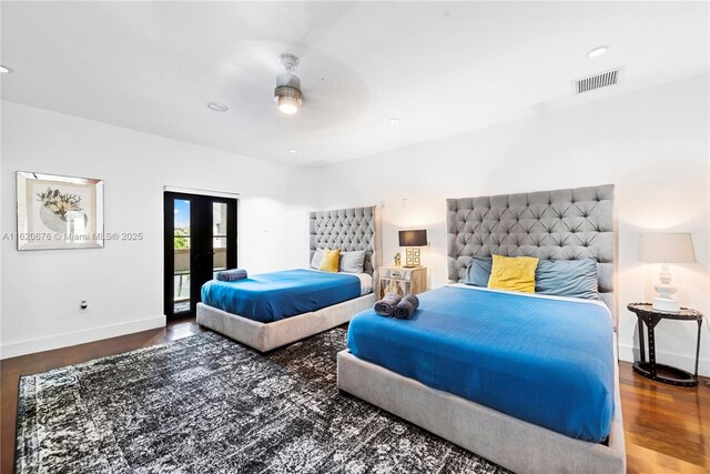 bedroom with access to outside, dark hardwood / wood-style floors, and ceiling fan