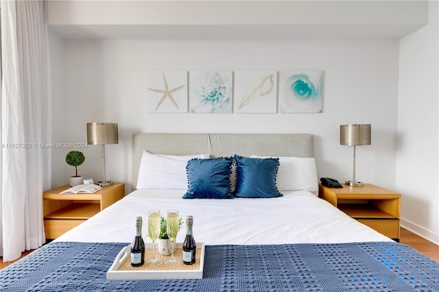 bedroom featuring hardwood / wood-style floors