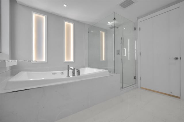 bathroom with independent shower and bath