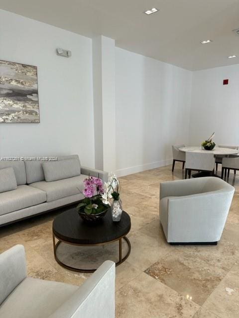 living room featuring light tile patterned flooring