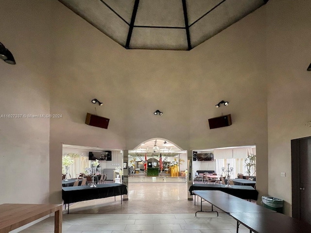 interior space with high vaulted ceiling