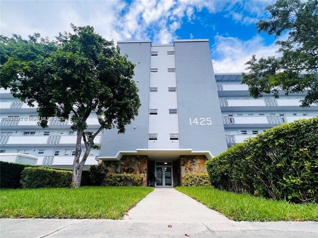 1425 Atlantic Shores Blvd Unit 409, Hallandale Beach, FL 33009 - bedroom featuring tile patterned floors