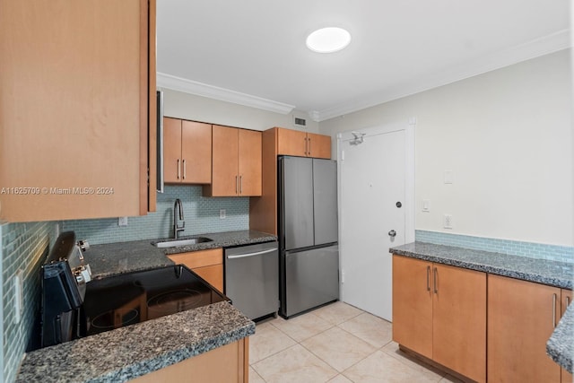 kitchen featuring stainless steel appliances, decorative backsplash, sink, ornamental molding, and light tile patterned flooring