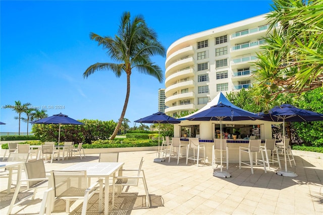 view of patio / terrace featuring exterior bar