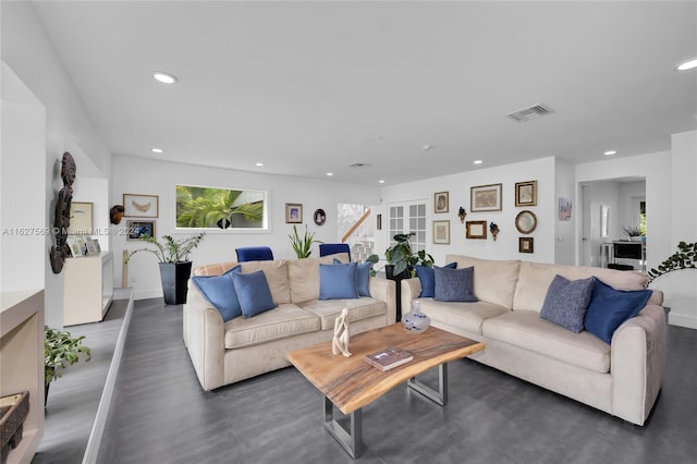 living room with dark hardwood / wood-style floors