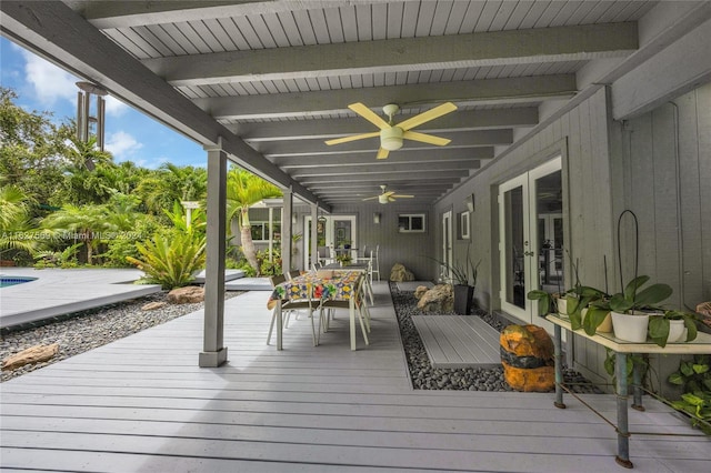 deck with french doors and ceiling fan