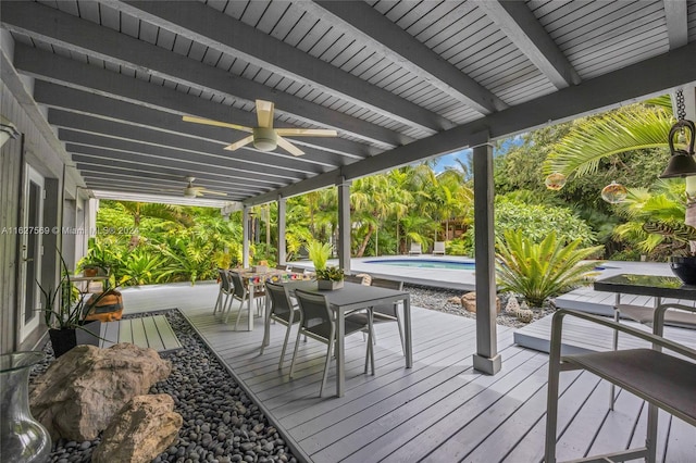 wooden terrace featuring ceiling fan