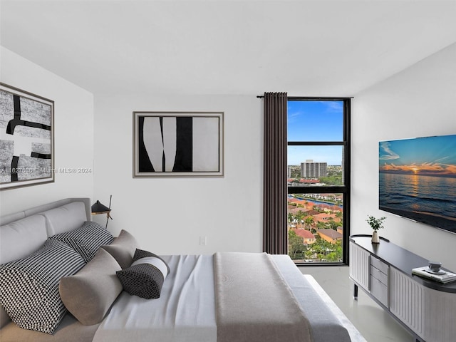 bedroom with a wall of windows