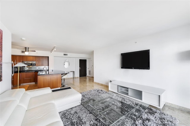 living room with ceiling fan