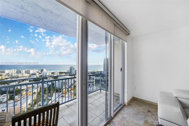 balcony featuring a water view