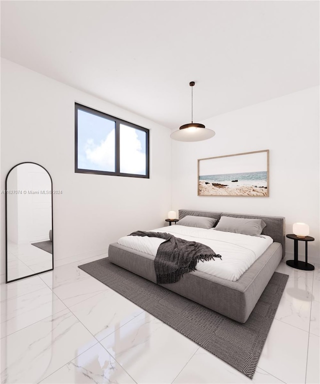 bedroom featuring light tile patterned flooring