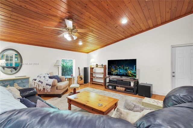 living room with vaulted ceiling, wood ceiling, ceiling fan, and light hardwood / wood-style floors