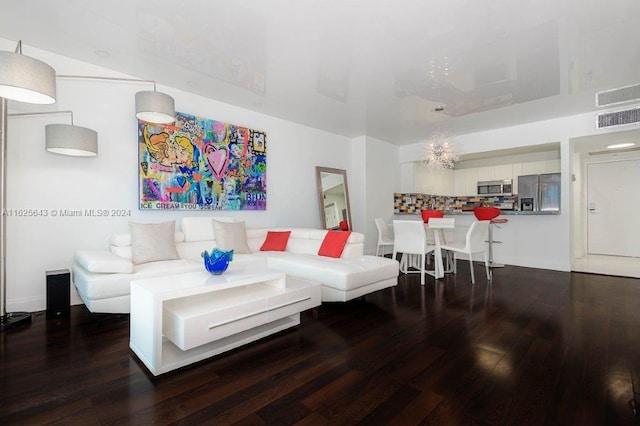 living room featuring dark wood-type flooring