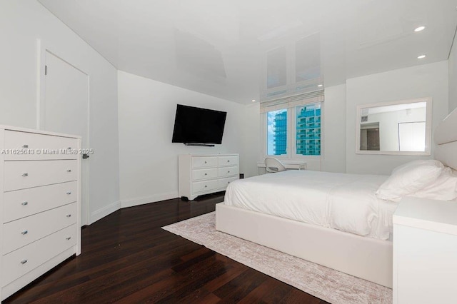 2301 Collins Ave Unit 1204, Miami Beach, FL 33139 - bedroom featuring dark wood finished floors and recessed lighting