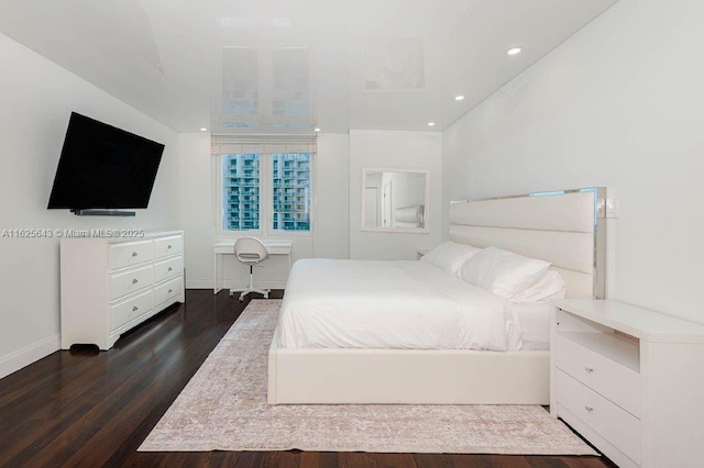 2301 Collins Ave Unit 1204, Miami Beach, FL 33139 - bedroom with dark wood finished floors and recessed lighting