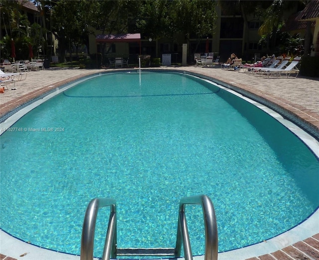 view of pool with a patio area