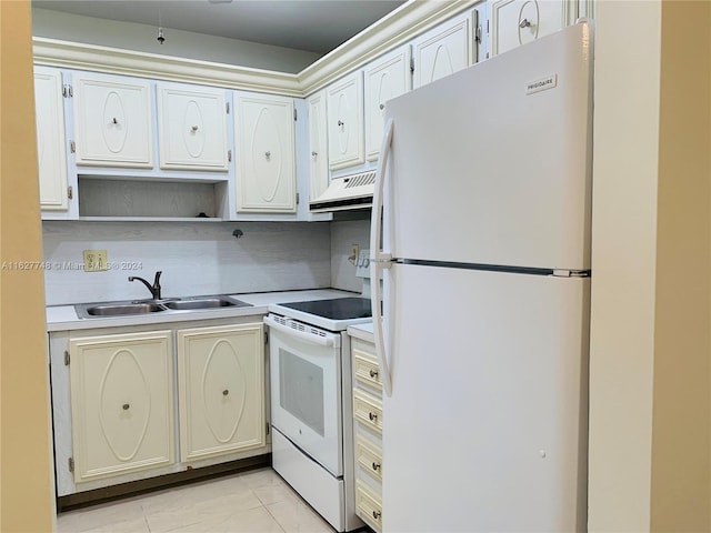 kitchen featuring white appliances, white cabinets, sink, light tile patterned floors, and custom exhaust hood