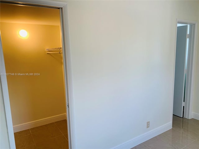 interior space featuring light tile patterned flooring