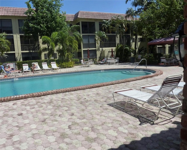 view of swimming pool featuring a patio