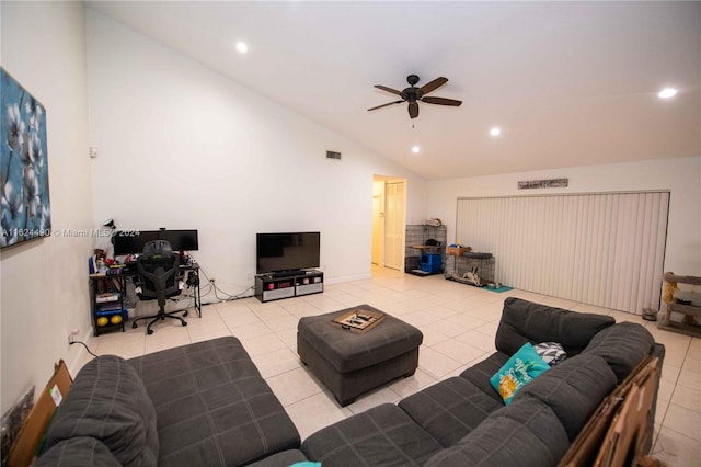 tiled living room with ceiling fan and vaulted ceiling