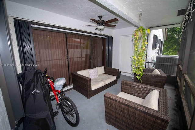 view of patio featuring an outdoor living space and ceiling fan