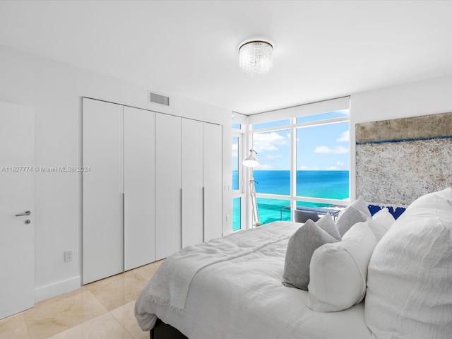 bedroom with a water view