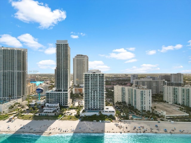 city view featuring a water view and a view of the beach