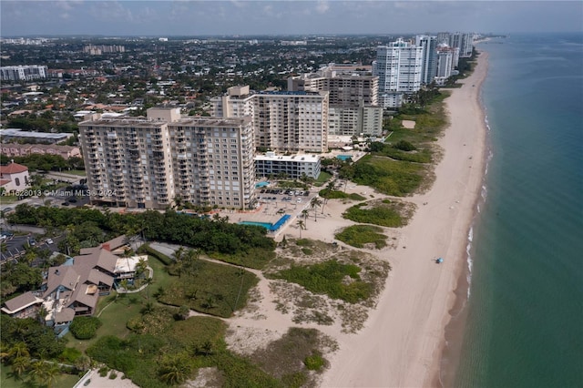 bird's eye view with a view of city, a beach view, and a water view