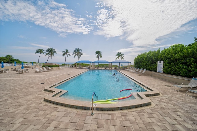 community pool with a patio