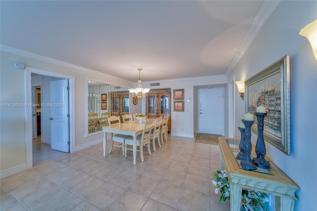 dining area featuring visible vents, baseboards, and crown molding