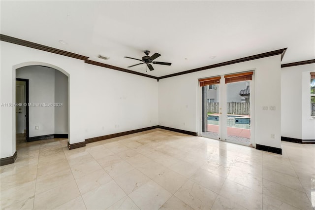 tiled spare room with ceiling fan, crown molding, and plenty of natural light