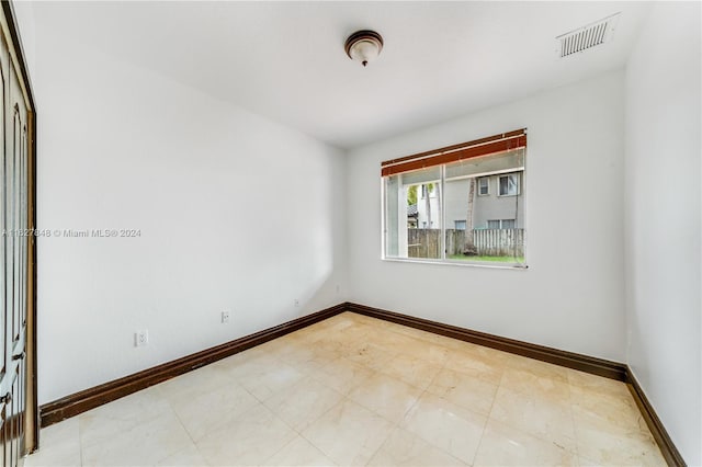 view of tiled empty room