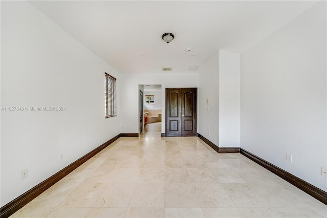 view of tiled empty room