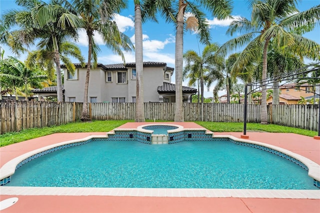 view of pool featuring an in ground hot tub