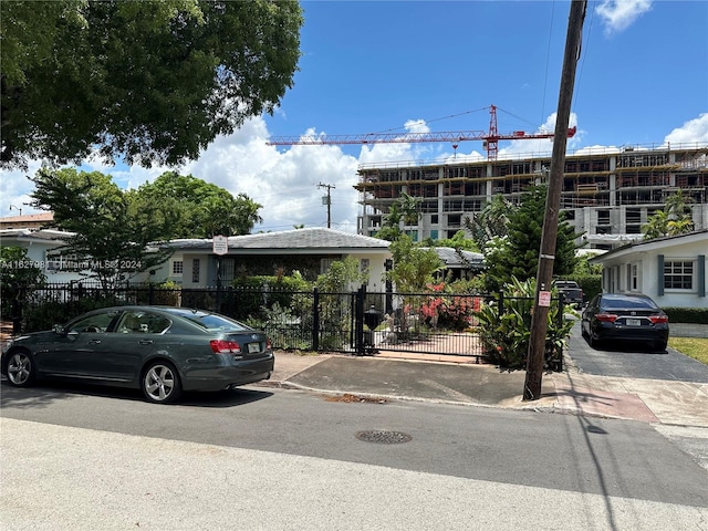 view of building exterior with fence