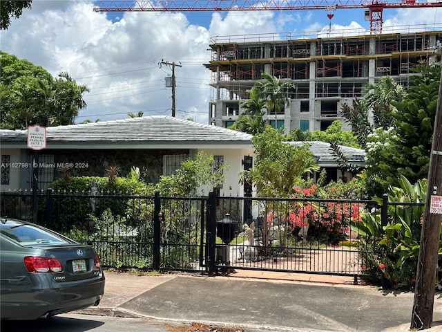 view of property featuring fence