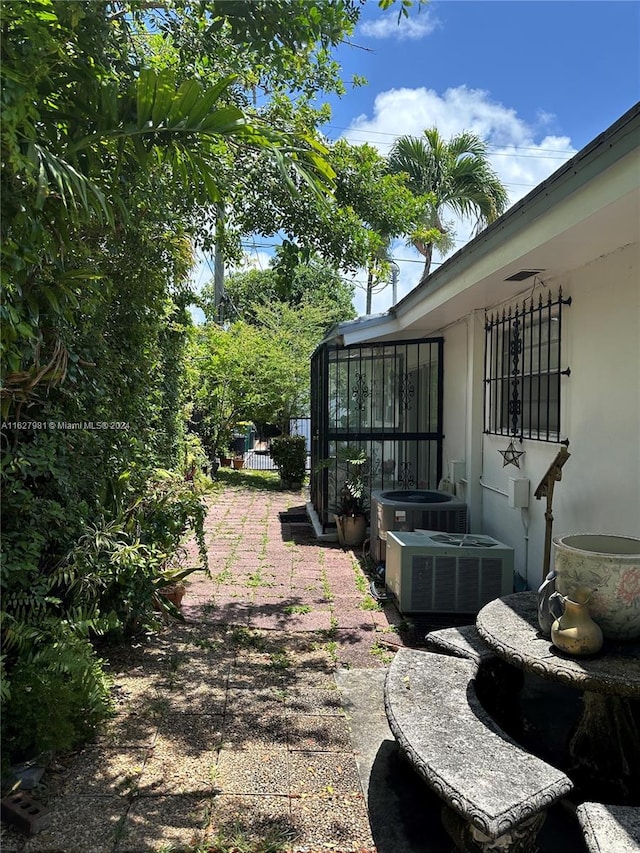 view of yard featuring central AC