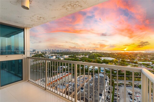 view of balcony at dusk