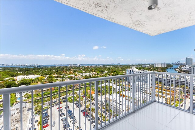 balcony featuring a water view