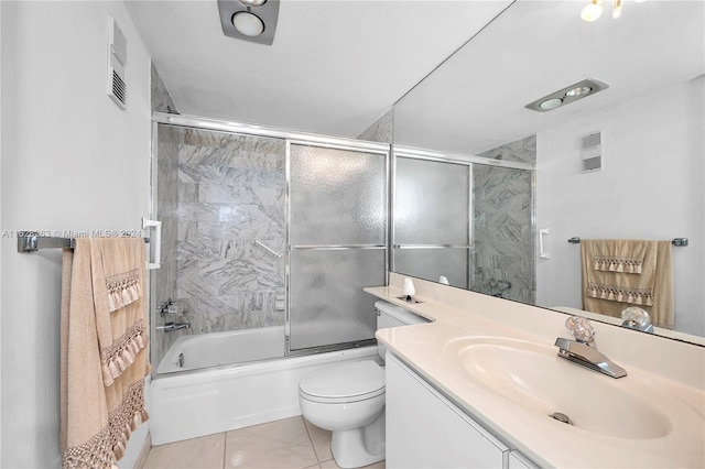 full bathroom featuring toilet, tile patterned floors, shower / bath combination with glass door, and vanity