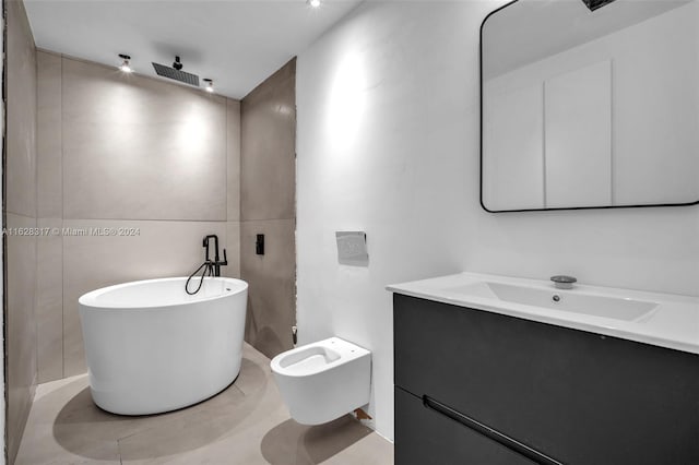 bathroom featuring a freestanding bath, a shower, and vanity