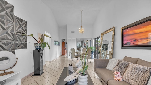 tiled living room featuring high vaulted ceiling and a chandelier