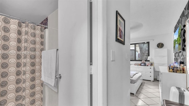 bathroom featuring vanity and tile patterned flooring