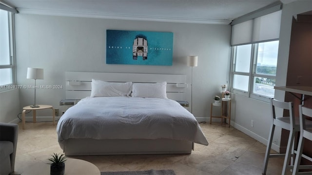 bedroom featuring ornamental molding