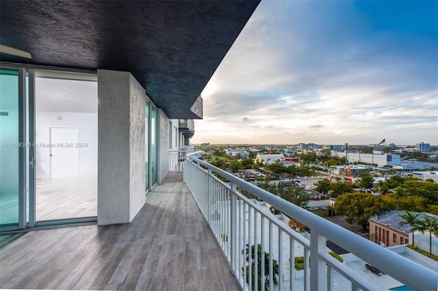 view of balcony at dusk