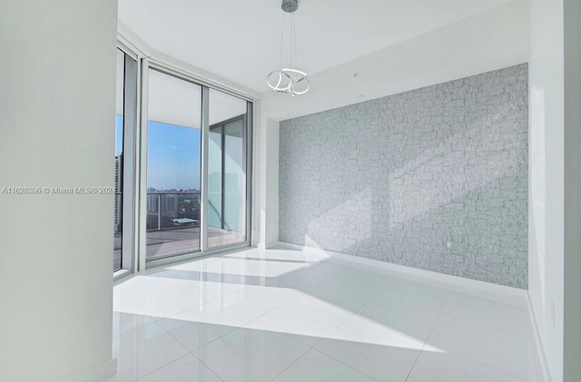 spare room featuring tile patterned floors