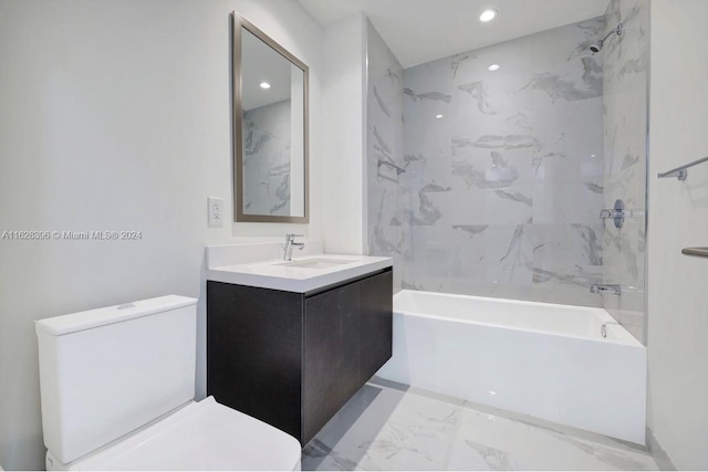 full bathroom featuring vanity, toilet, and tiled shower / bath combo