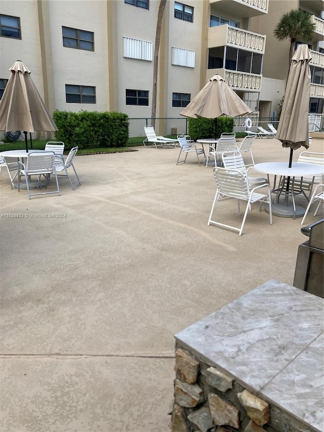 view of patio with fence