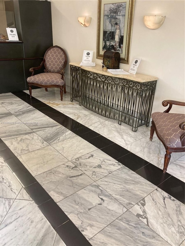 living area with tile patterned flooring